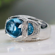 Load image into Gallery viewer, Blue topaz ring with floating diamonds in 14k white gold