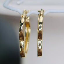 Load image into Gallery viewer, Heart shaped hoops in 14k yellow gold