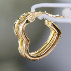 Heart shaped hoops in 14k yellow gold