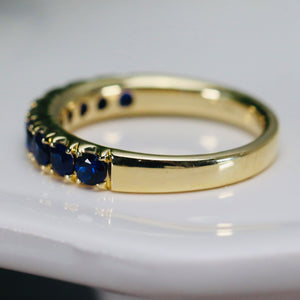 High quality sapphire band in 14k yellow gold