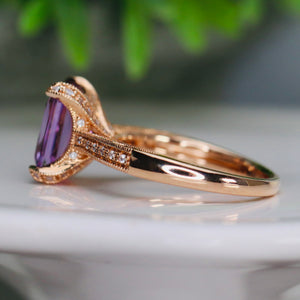 Emerald cut amethyst and diamond ring in 14k rose gold