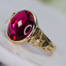 Load image into Gallery viewer, Smooth top oval synthetic ruby ring in yellow gold