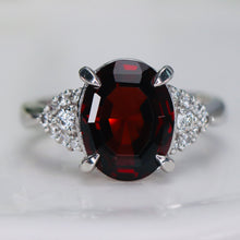 Load image into Gallery viewer, Step cut 4.34ct oval garnet and diamond ring in platinum