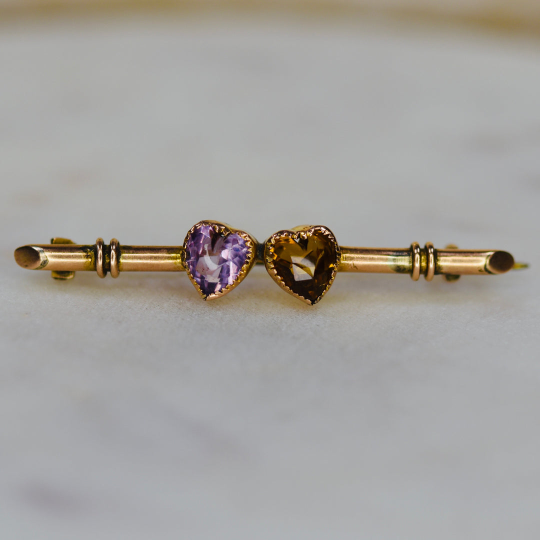 Vintage double heart brooch pin with amethyst and citrine in yellow gold from Manor Jewels