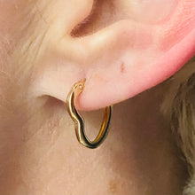 Load image into Gallery viewer, Heart shaped hoops in 14k yellow gold