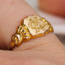 Load image into Gallery viewer, Antique shield shaped MC/CM signet ring in yellow gold