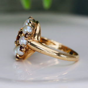 Stunning garnet and pearl ring in 14k yellow gold