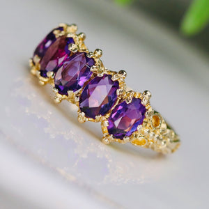Stunning 5 stone amethyst band in yellow gold