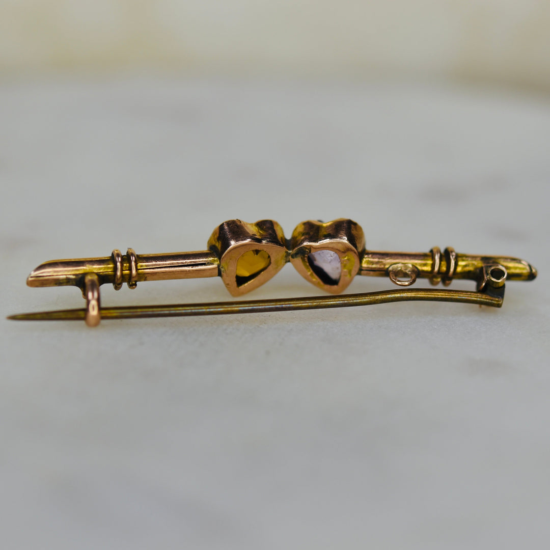 Vintage double heart brooch pin with amethyst and citrine in yellow gold from Manor Jewels