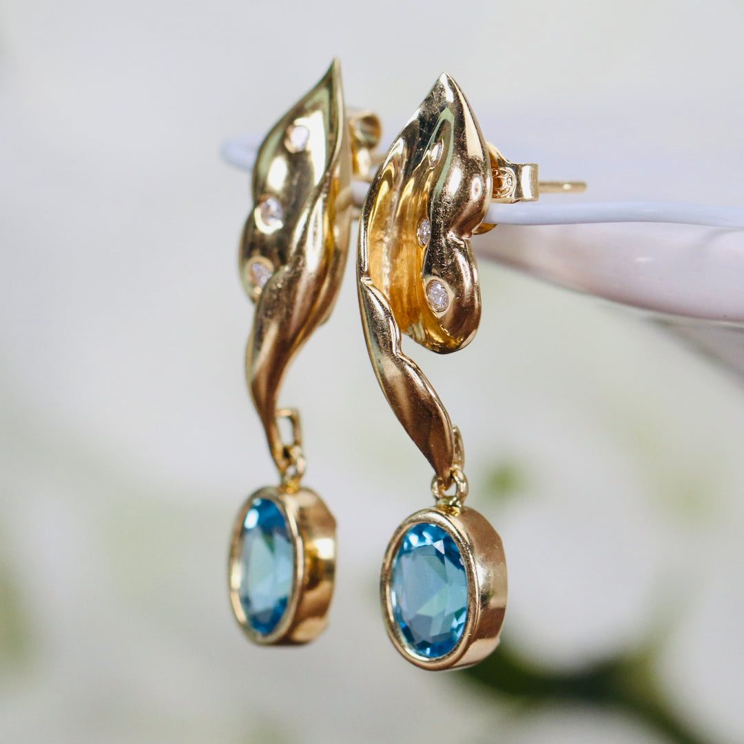 Estate blue topaz and diamond earrings in 14k yellow gold from Manor Jewels