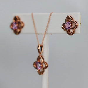 Amethyst necklace and earrings set in rose gold