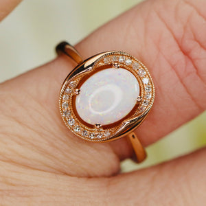 Opal and diamond ring in 14k rose gold by Effy