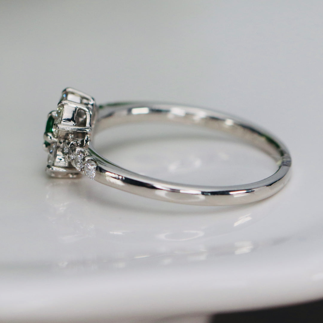 Estate tsavorite garnet and diamond ring in platinum
