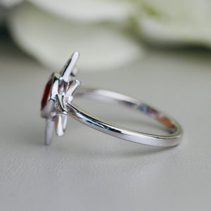 Ruby and diamond compass star ring in 14k white gold