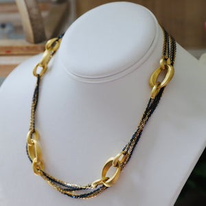 34” necklace in 18k yellow gold with blue rhodium