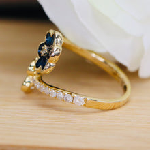 Load image into Gallery viewer, Sapphire and diamond flower style bypass ring in 14k white gold