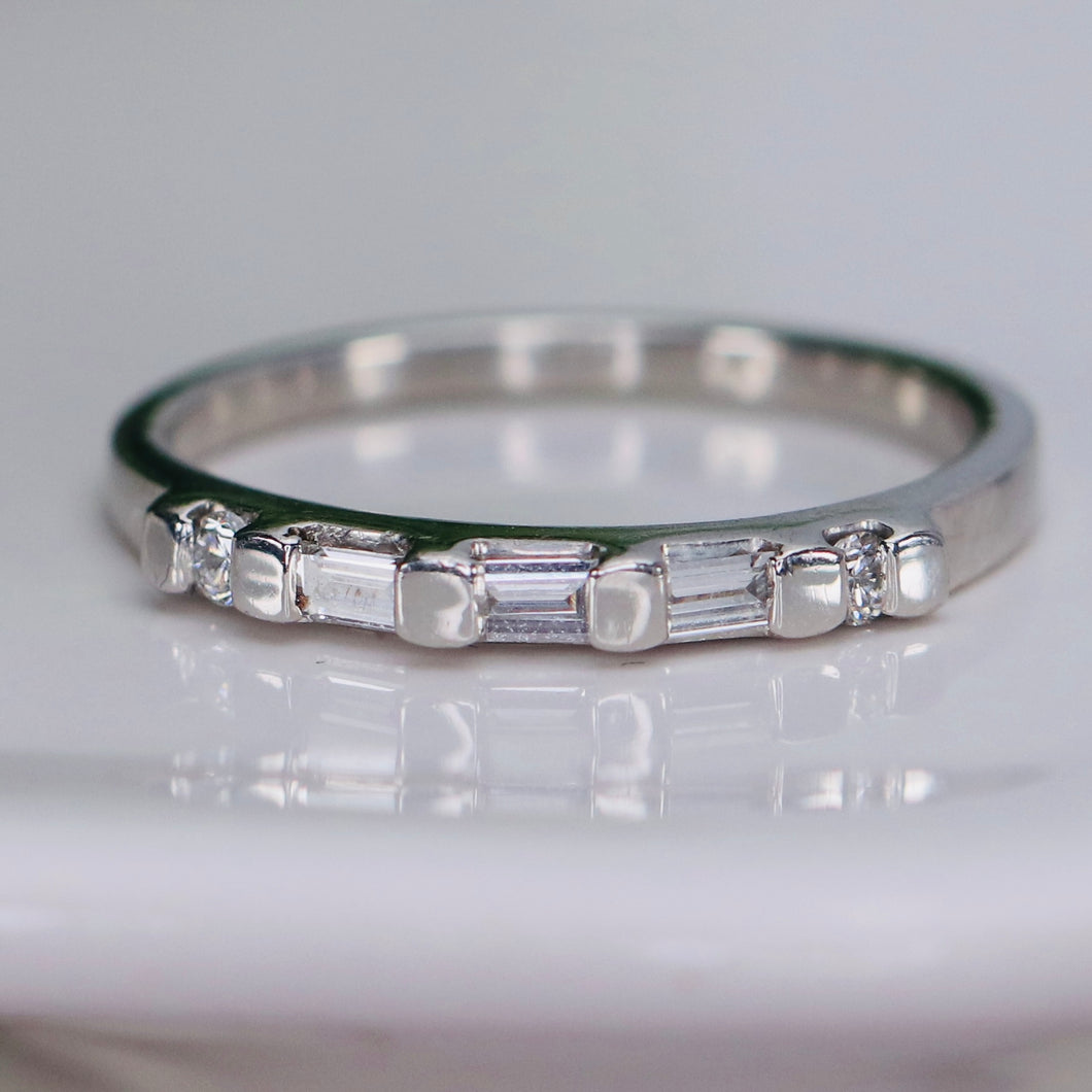 Estate platinum baguette and round cut diamond band