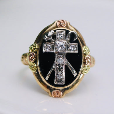 Unusual diamond cross oval onyx ring in yellow gold