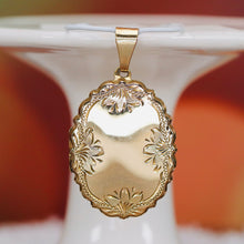 Load image into Gallery viewer, Large oval engraved locket in yellow gold