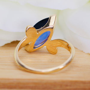 Marquise cut synthetic blue sapphire ring in yellow gold