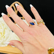 Load image into Gallery viewer, Marquise cut synthetic blue sapphire ring in yellow gold