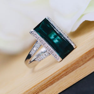 Estate green tourmaline and diamond ring in platinum