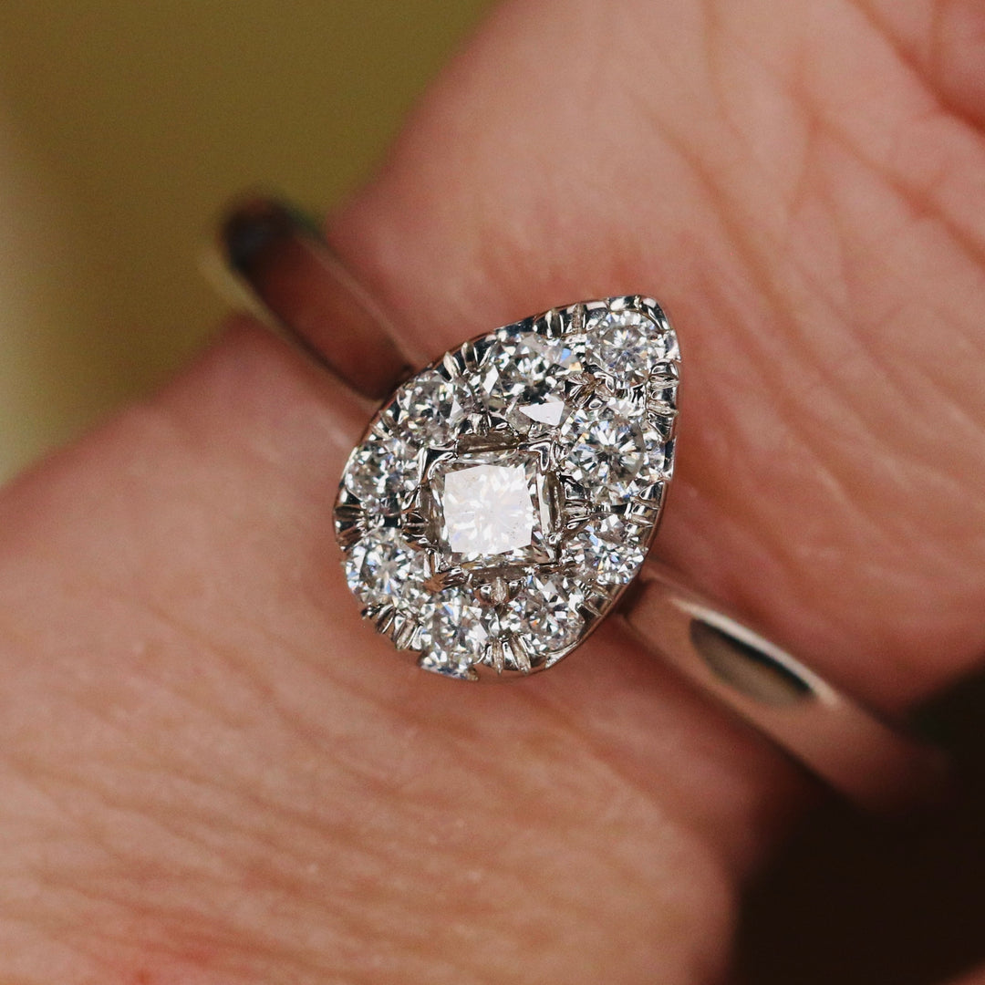Pear shape diamond cluster ring in 14k white gold