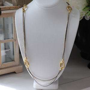 34” necklace in 18k yellow gold with blue rhodium