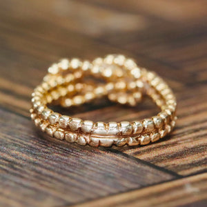 Lovers knot ring in 14k yellow gold