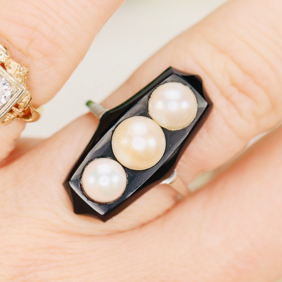 Vintage onyx and pearl ring in platinum
