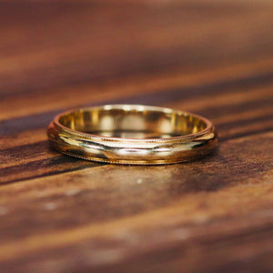 Vintage Art carved band in 14k yellow gold