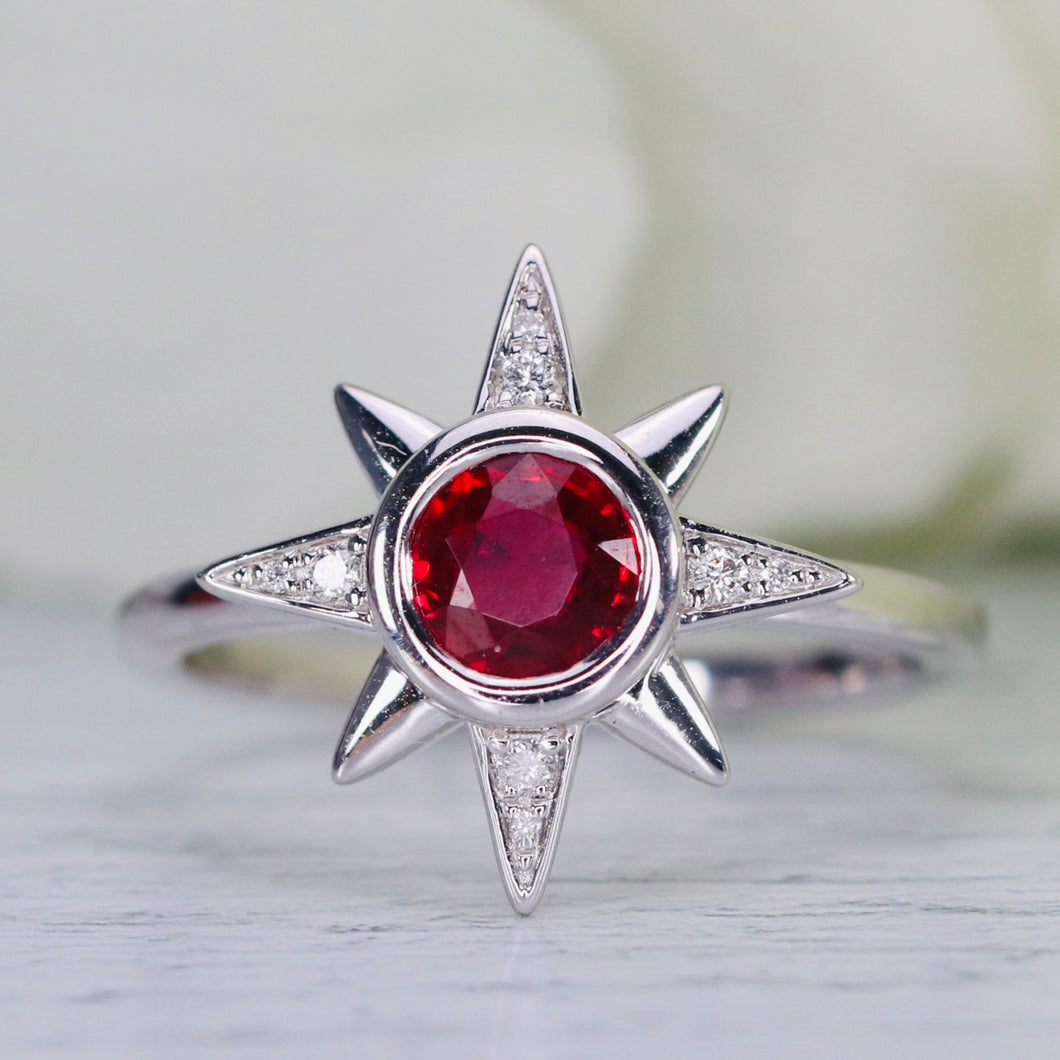 Ruby and diamond compass star ring in 14k white gold