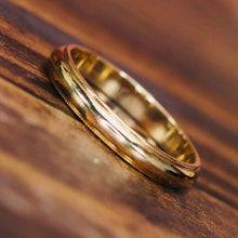 Load image into Gallery viewer, Vintage Art carved band in 14k yellow gold