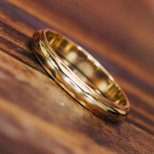 Vintage Art carved band in 14k yellow gold