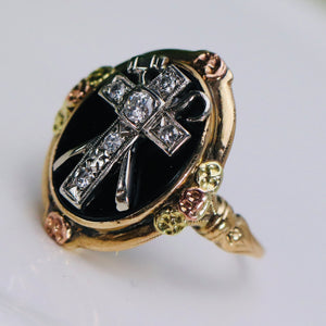 Unusual diamond cross oval onyx ring in yellow gold