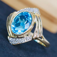 Load image into Gallery viewer, Swiss blue topaz and diamond ring in 14k yellow gold