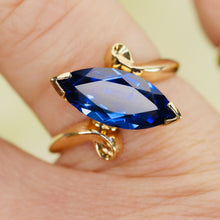 Load image into Gallery viewer, Marquise cut synthetic blue sapphire ring in yellow gold