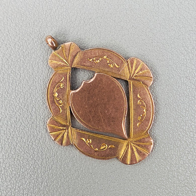 Vintage rose gold shield medal from 1924