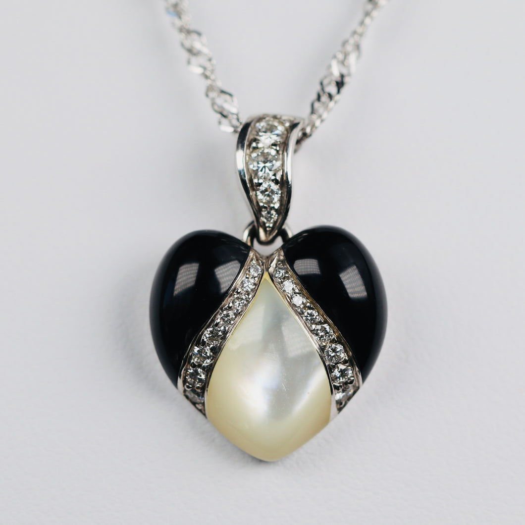 Onyx, mother of pearl and diamond pendant from Kabana