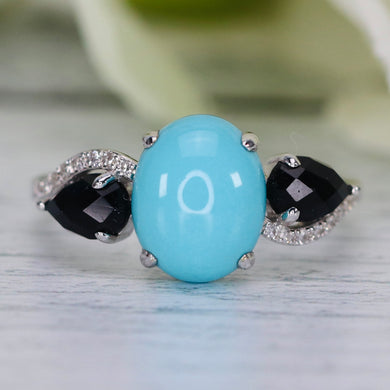 Turquoise, onyx, and diamond ring in 14k white gold