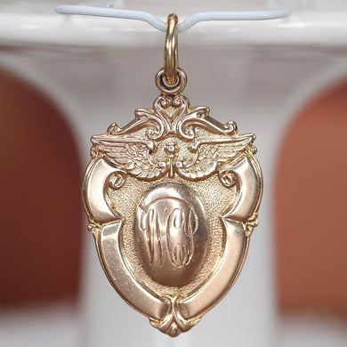 Heavy and detailed vintage medal in yellow gold