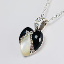 Load image into Gallery viewer, Onyx, mother of pearl and diamond pendant from Kabana