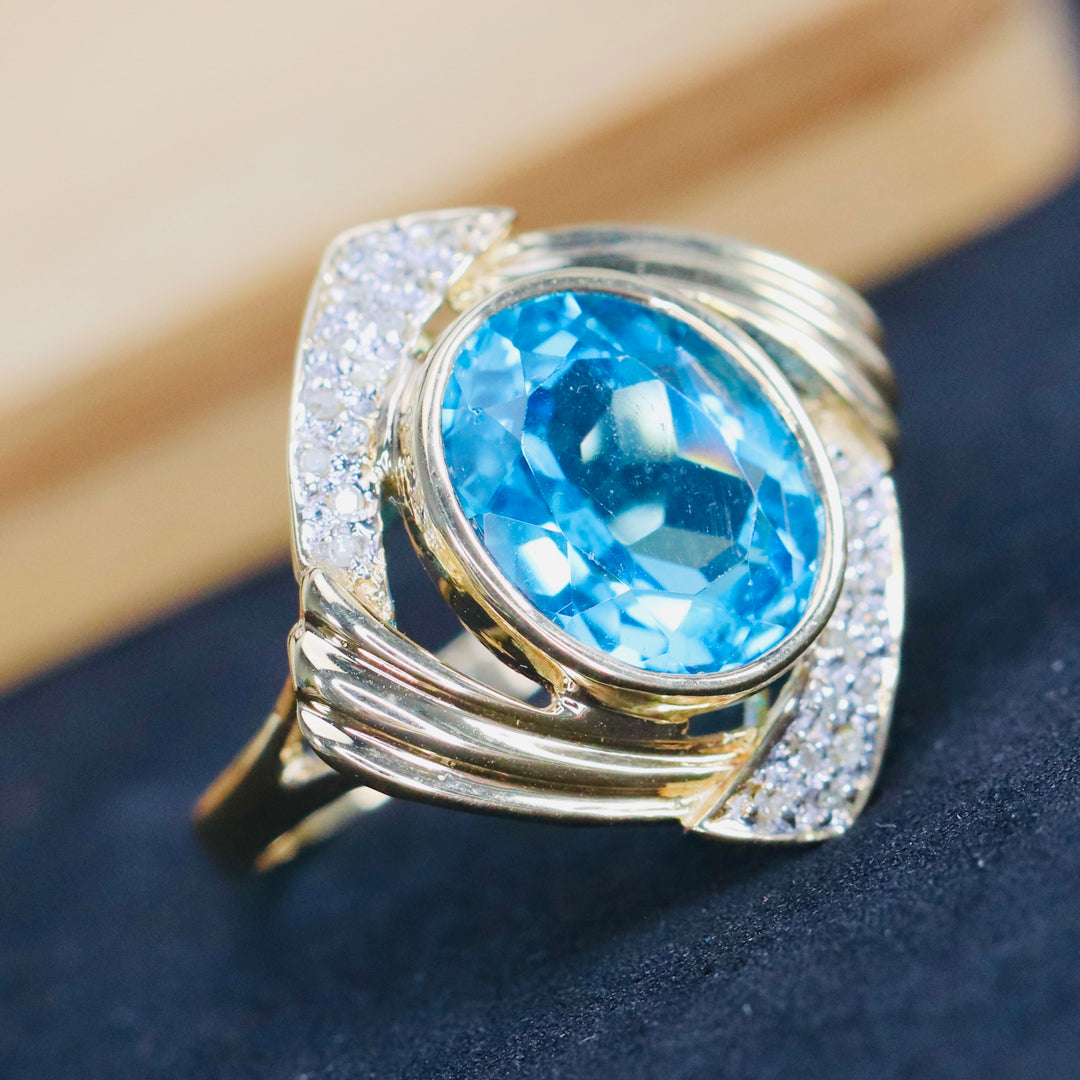 CLEARANCE!! Swiss blue topaz and diamond ring in 14k yellow gold