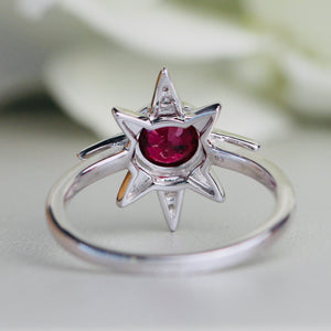 Ruby and diamond compass star ring in 14k white gold