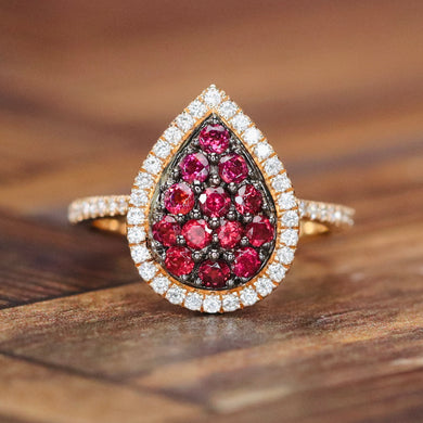 Rhodolite and diamond pear shape cluster ring in 14k rose gold