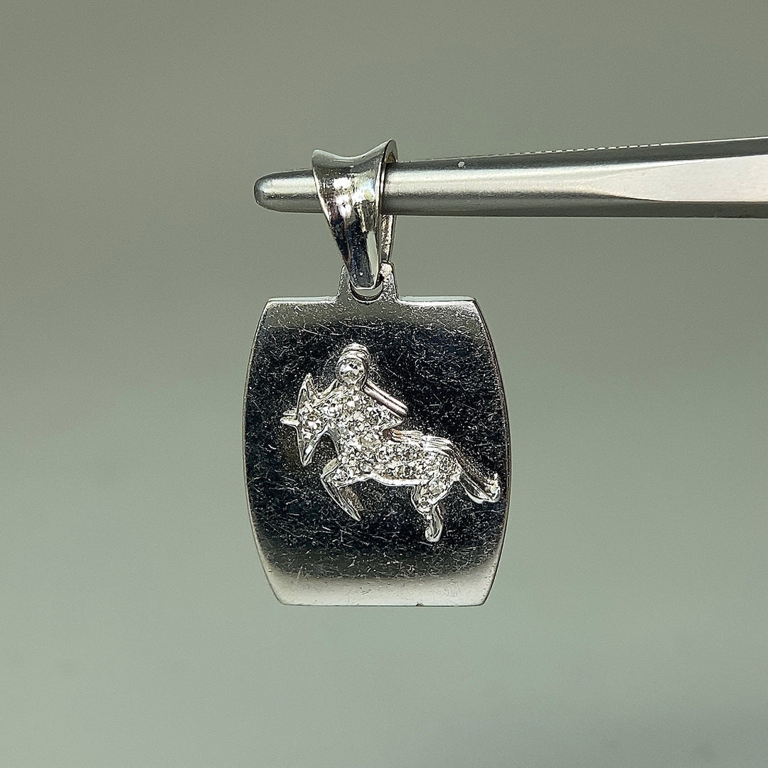 Diamond Sagittarius pendant in 18k white gold