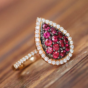 Rhodolite and diamond pear shape cluster ring in 14k rose gold