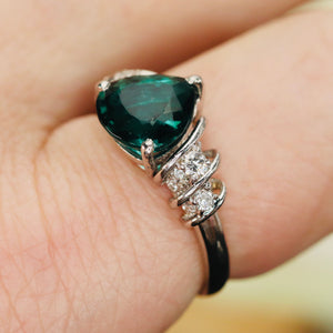 Estate chunky pear shaped green tourmaline and diamond ring in platinum