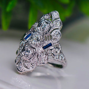 Large transitional cut diamond and sapphire plaque ring in 18k white gold