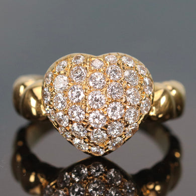 Heart shaped diamond cluster ring in 18k yellow gold